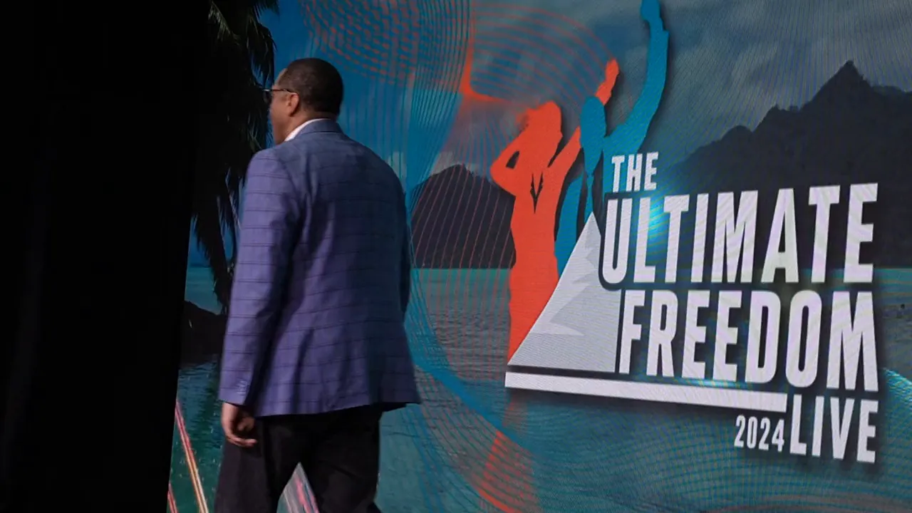 Michael E. Parker speaking on the Ultimate Freedom LIVE stage